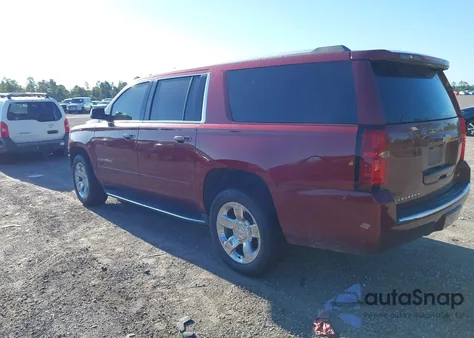 2018 Chevrolet Suburban Premier z USA, uszkodzony, nr VIN 1GNSCJKCXJR150912
